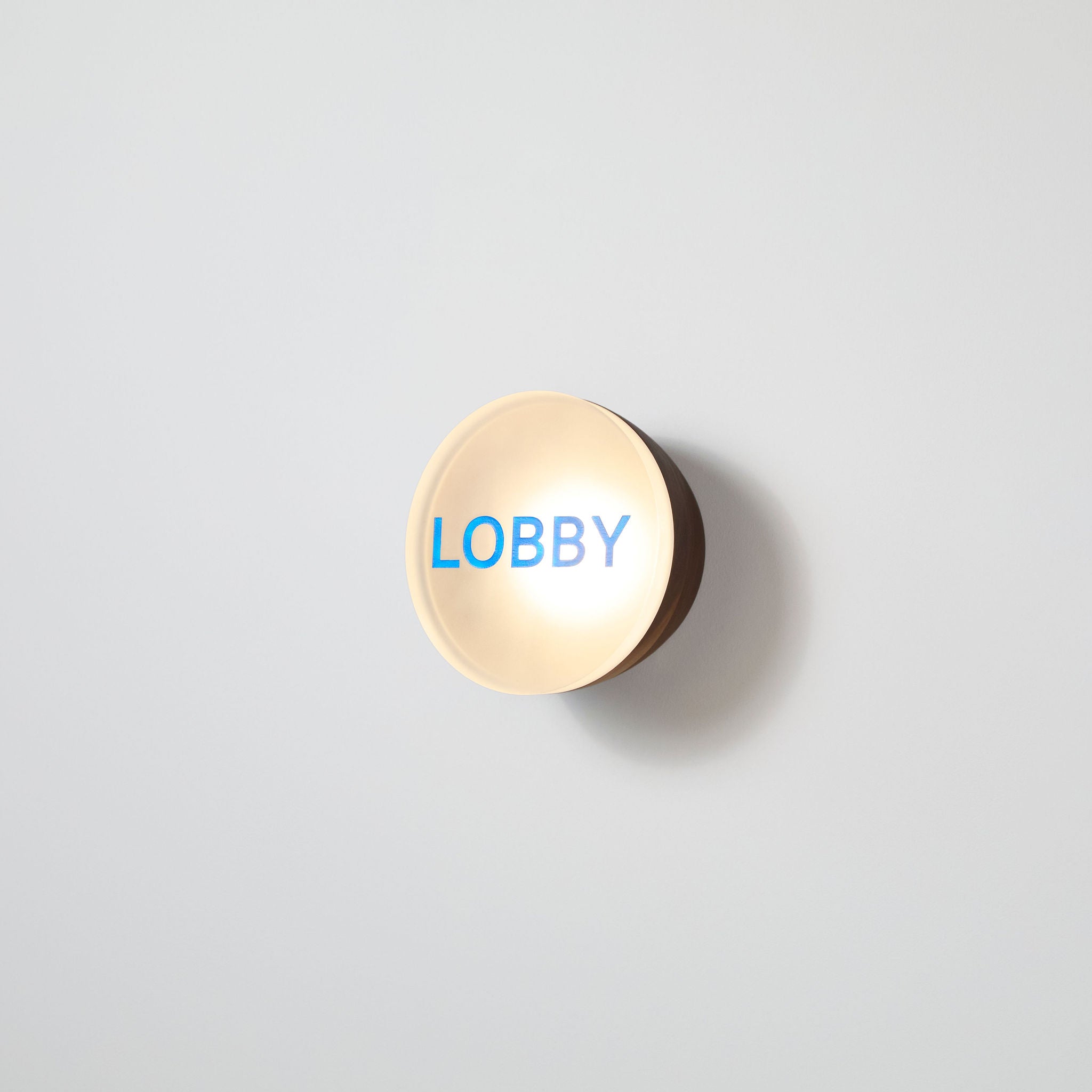 hollis morris berm acrylic walnut signage lobby on